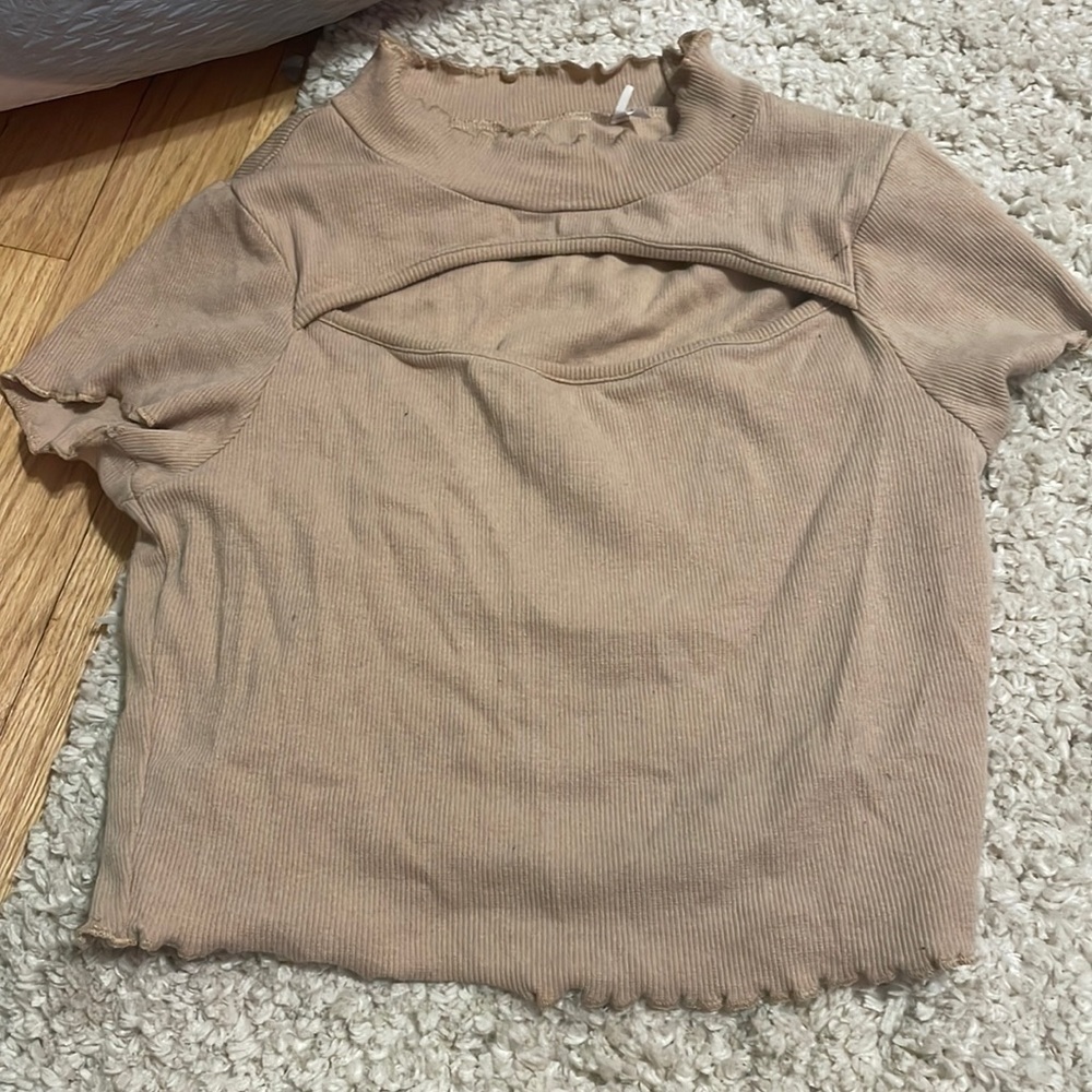 tan pacsun shirt with cut out in middle